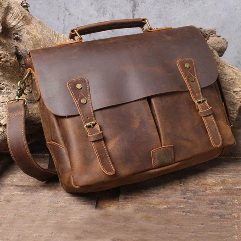 Stylish leather briefcases for professionals displayed alongside accessories on a wooden table