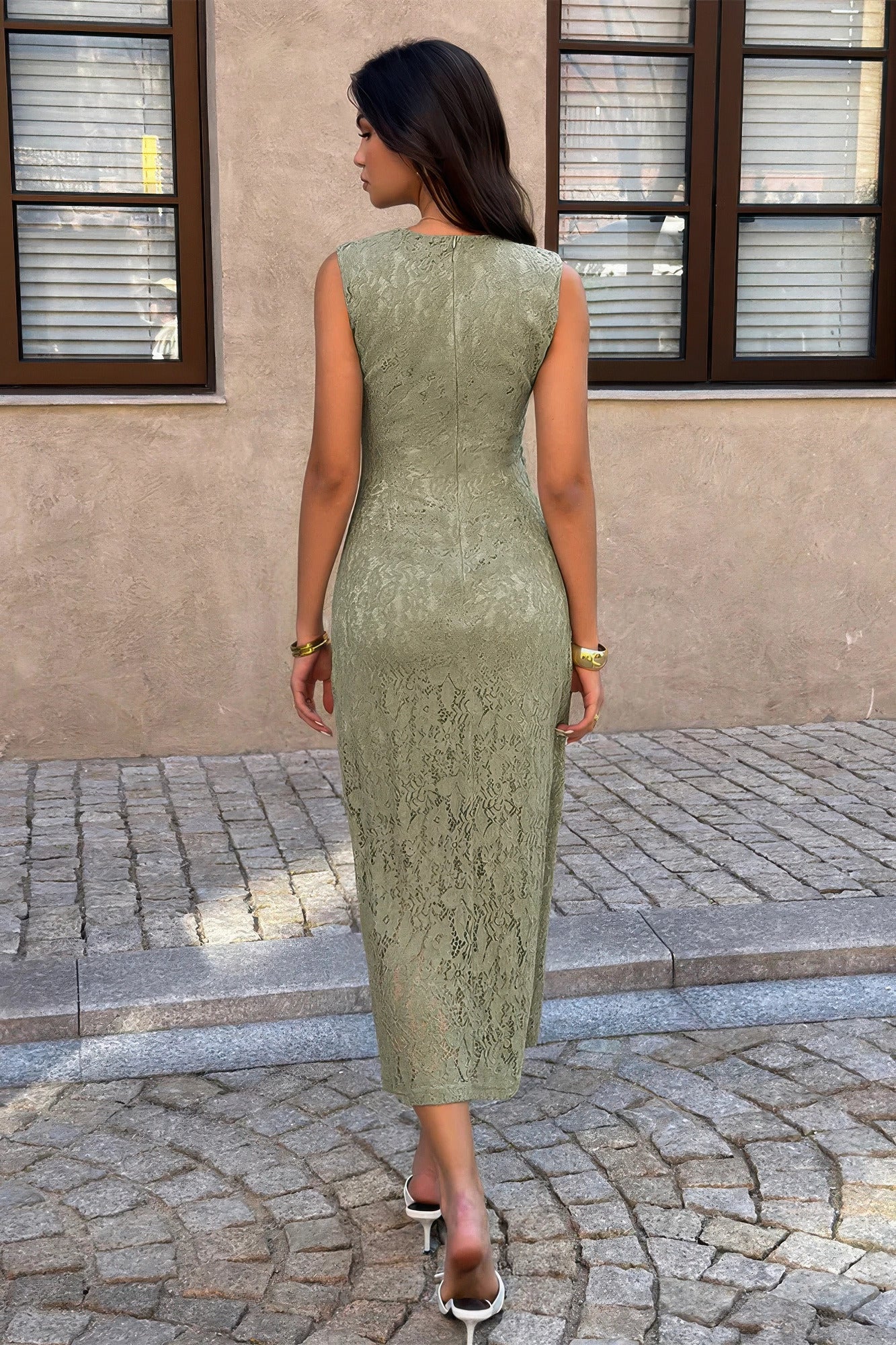 Women's green lace cocktail dress, perfect for evening events