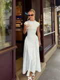 White polka dot and maxi dress, perfect for summer outings
