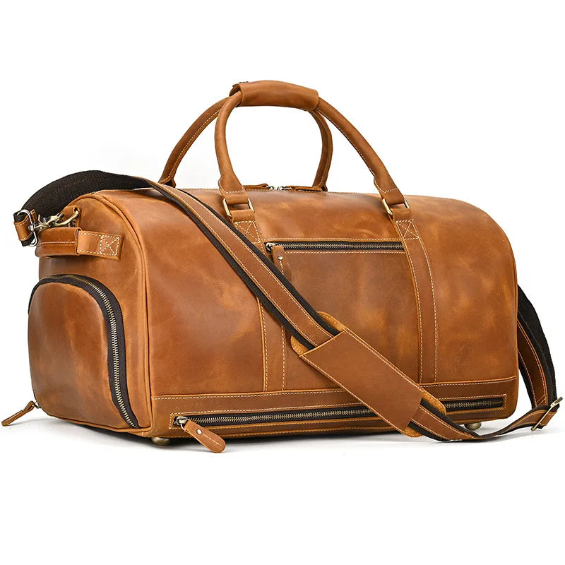 Brown leather duffel bag, perfect for travel and sports use
