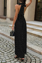 Women's black polka dot bodycon dress with a stylish back tie design