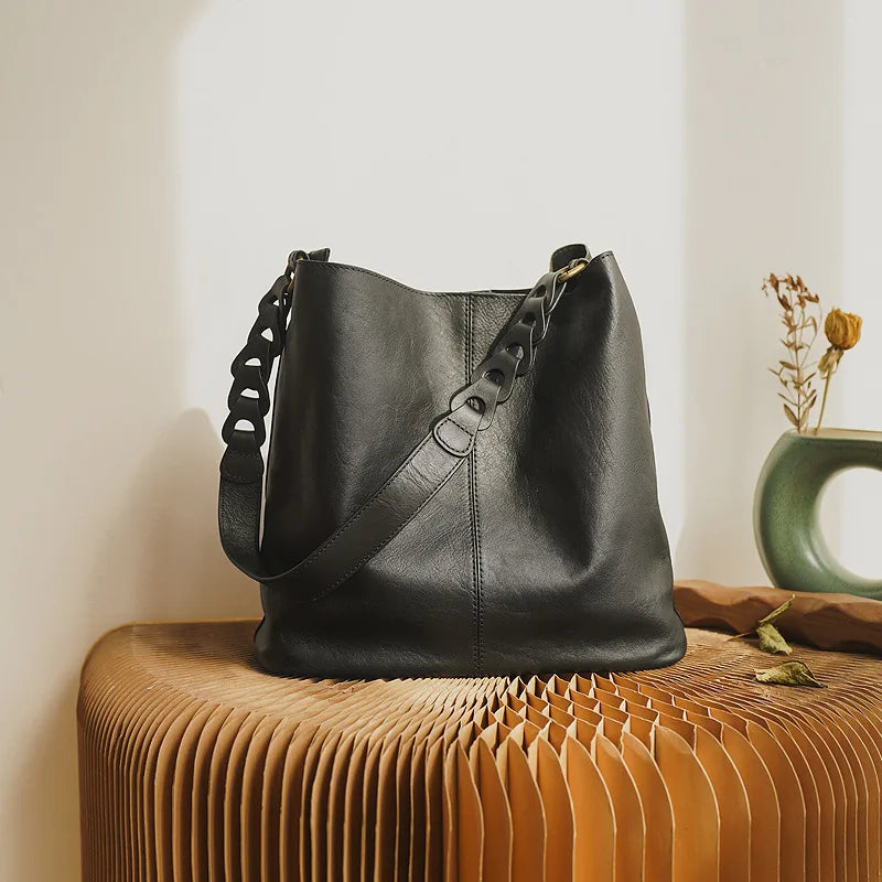 Black leather coach purse shoulder bag with stylish chain strap
