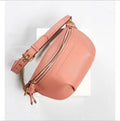 Stylish pink leather fanny pack from VacationGrabs featuring a gold zipper and adjustable strap