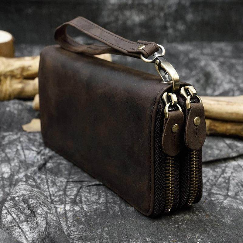 Crazy horse leather wallet with multiple compartments and a detachable wrist strap for easy carrying