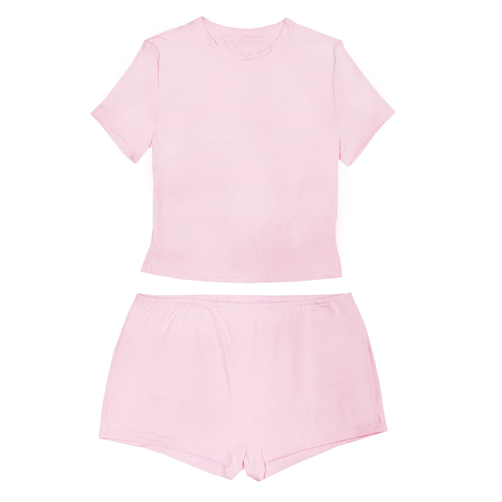 Women's pink crop top and shorts set for casual outings