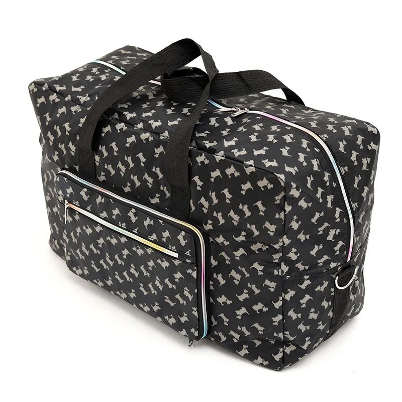 Black duffle bag with dog print, perfect for travel and overnight trips