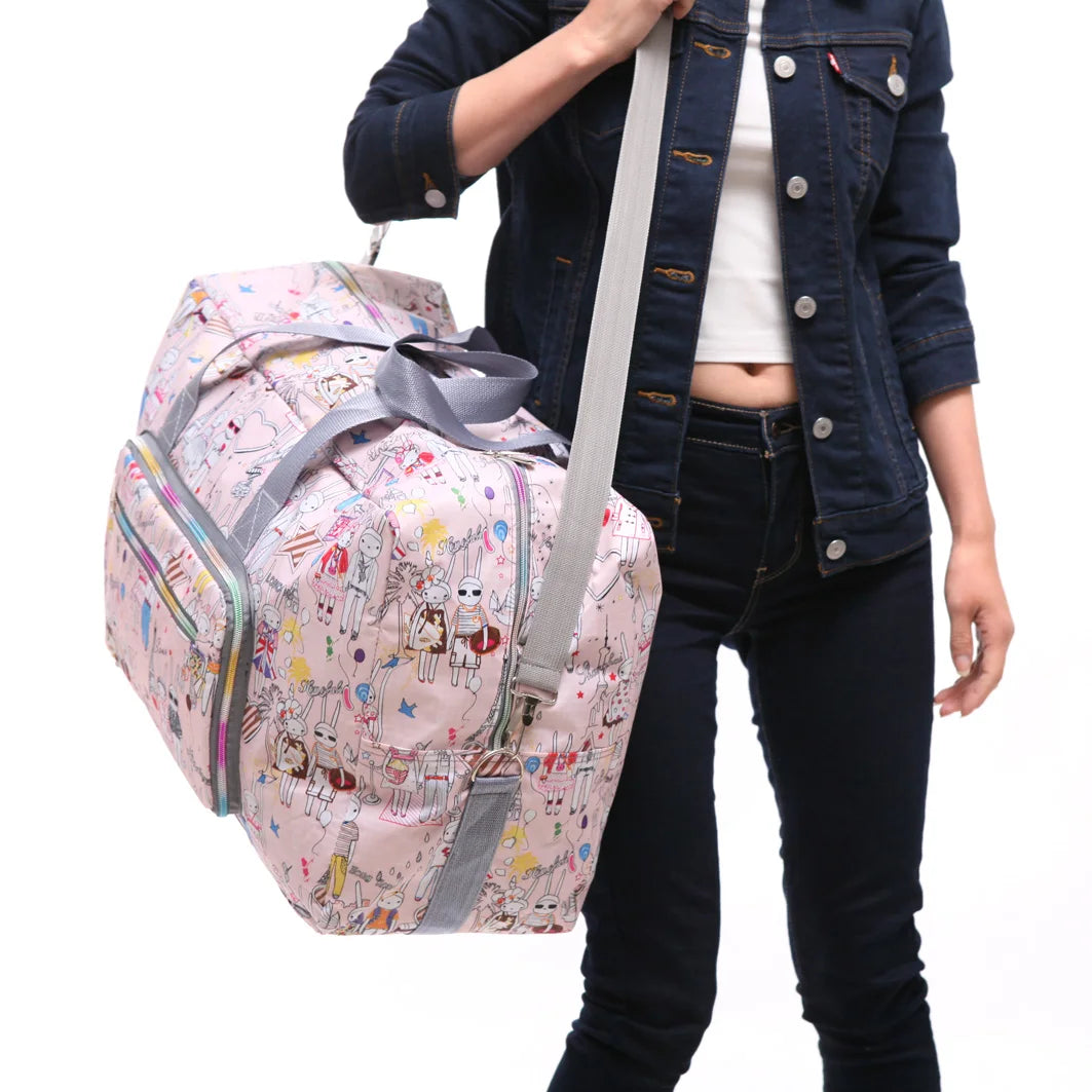 Pink graphic duffle bag, durable material, perfect for travel