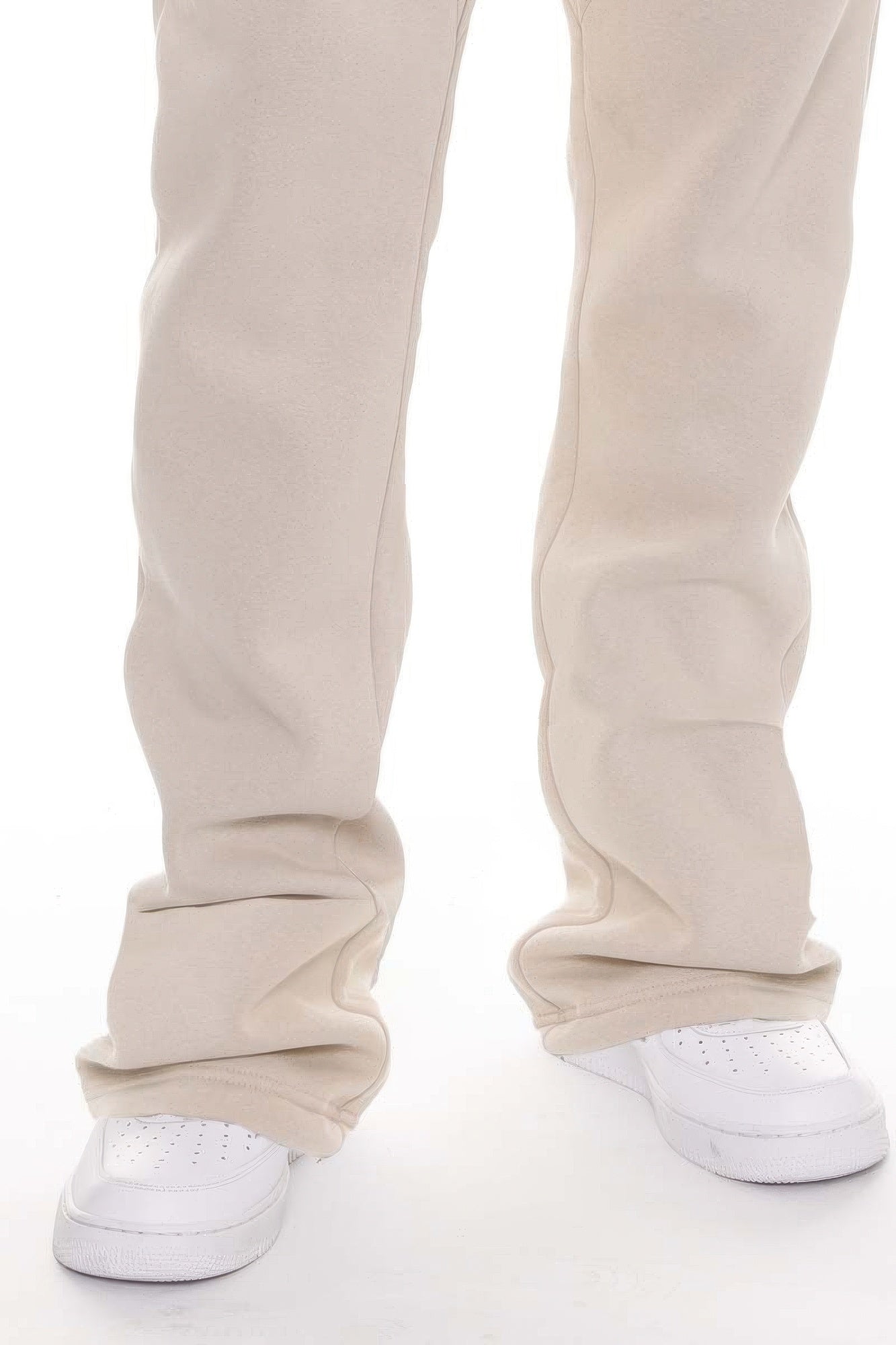 Beige flared track pants in soft cotton, perfect for casual outings