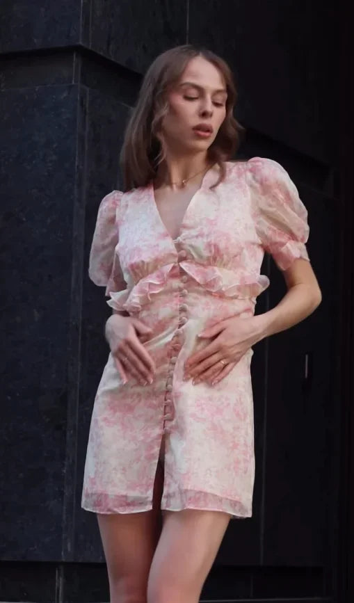 Floral mini dress in pink with ruffle detail, perfect for summer outings