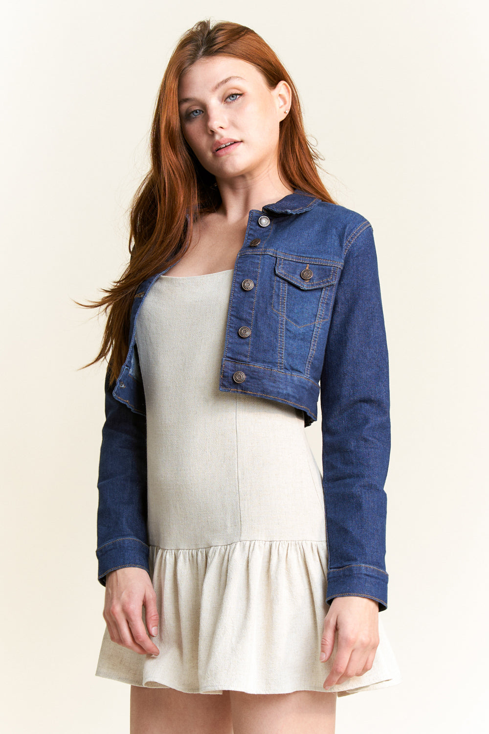 Women's denim jacket in dark blue for stylish layering