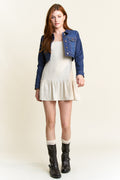 Women's denim jacket by Shop ENJEAN, styled over a casual dress