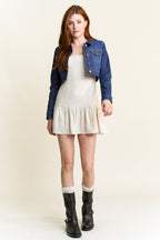 Women's denim jacket by Shop ENJEAN, styled over a casual dress