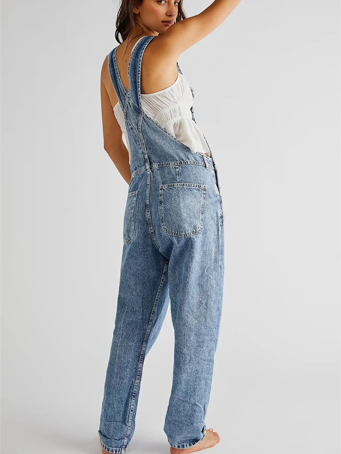 Ladies overalls denim in light blue, perfect for casual outings.