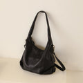 Black leather crossbody mini bag, perfect for everyday use