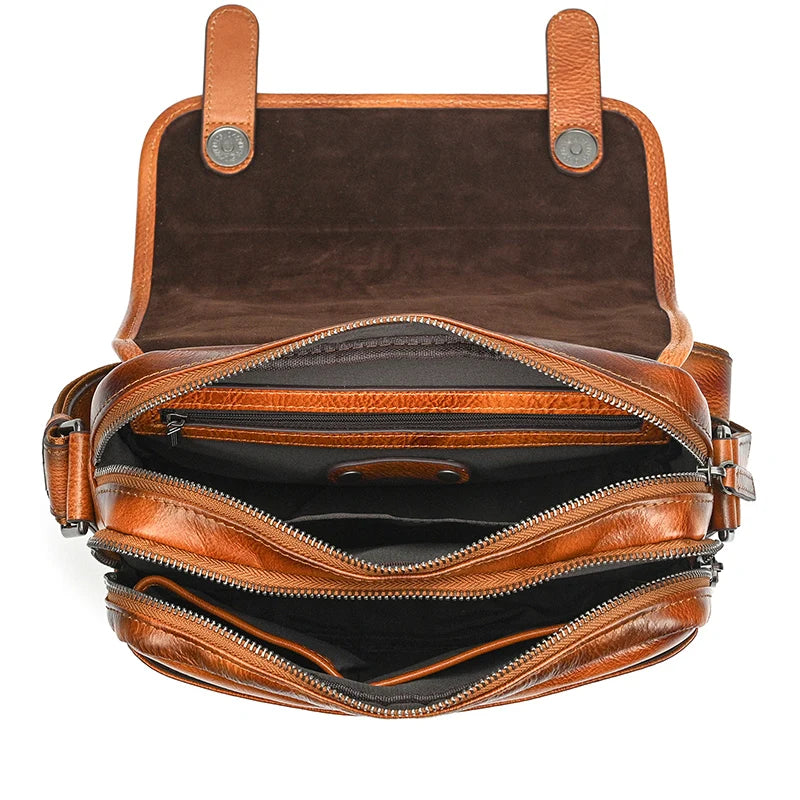 Brown leather crossbody mini bag with multiple zip compartments
