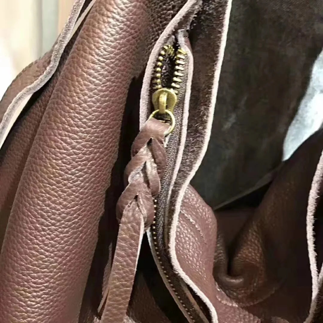 brown leather crossbody mini bag with stylish zipper detail