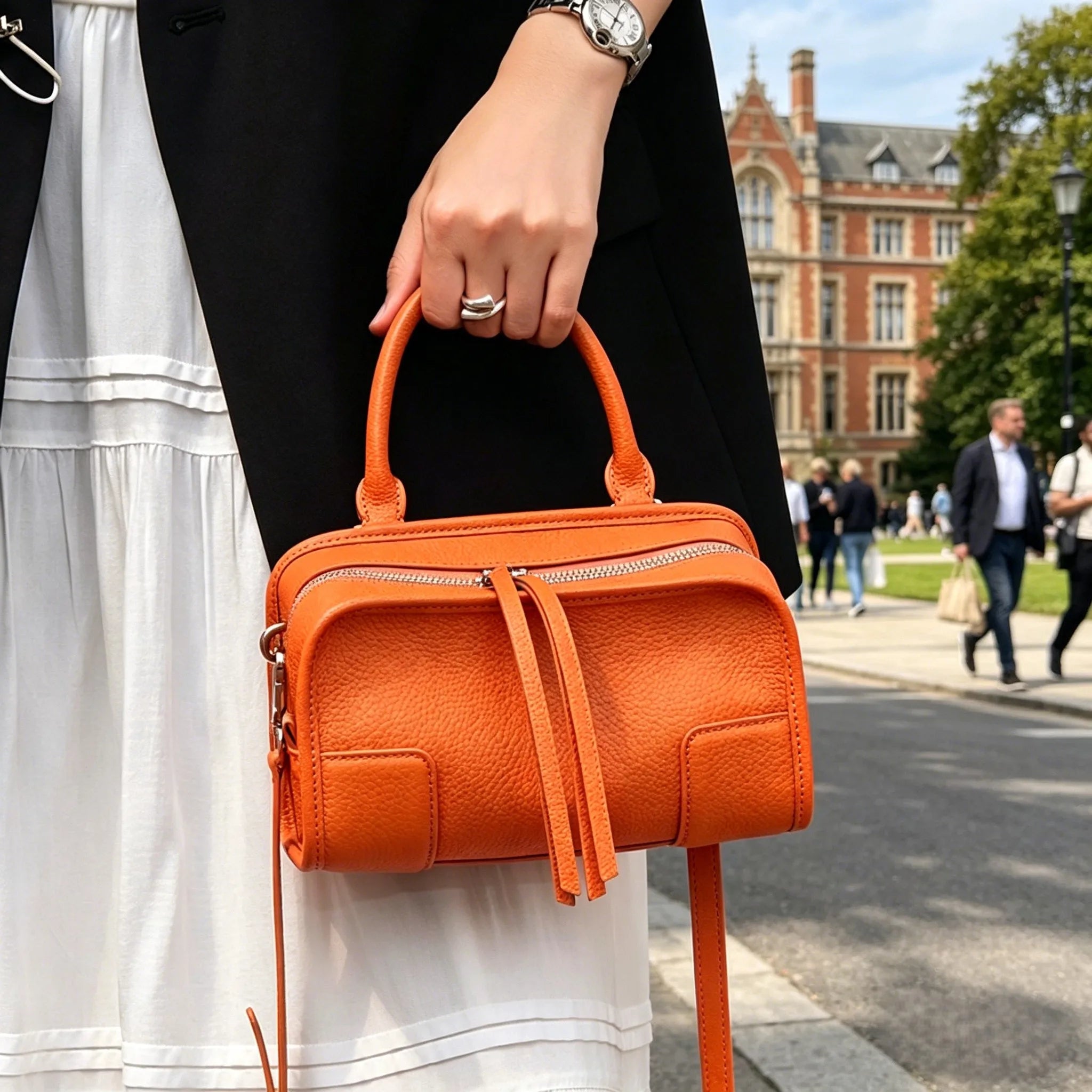 Orange leather crossbody mini bag, stylish for daily use