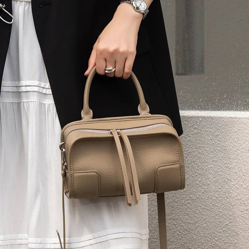 Tan leather crossbody mini bag for stylish on-the-go use