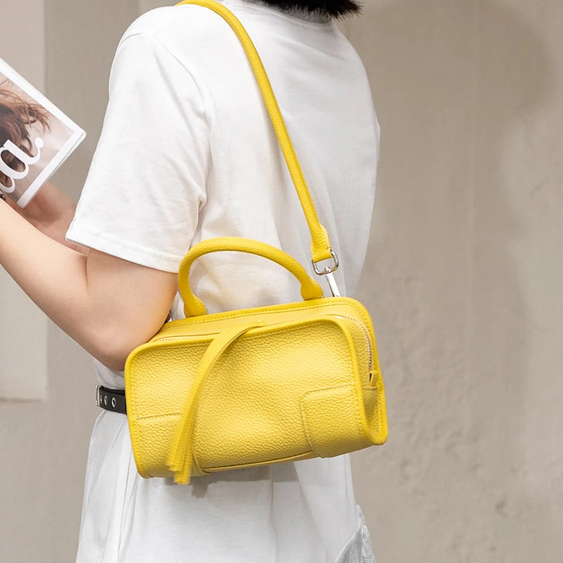 Yellow leather crossbody mini bag, perfect for daily outings