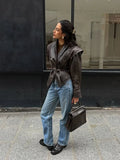 Women's brown leather faux jacket, stylish urban outfit for casual outings
