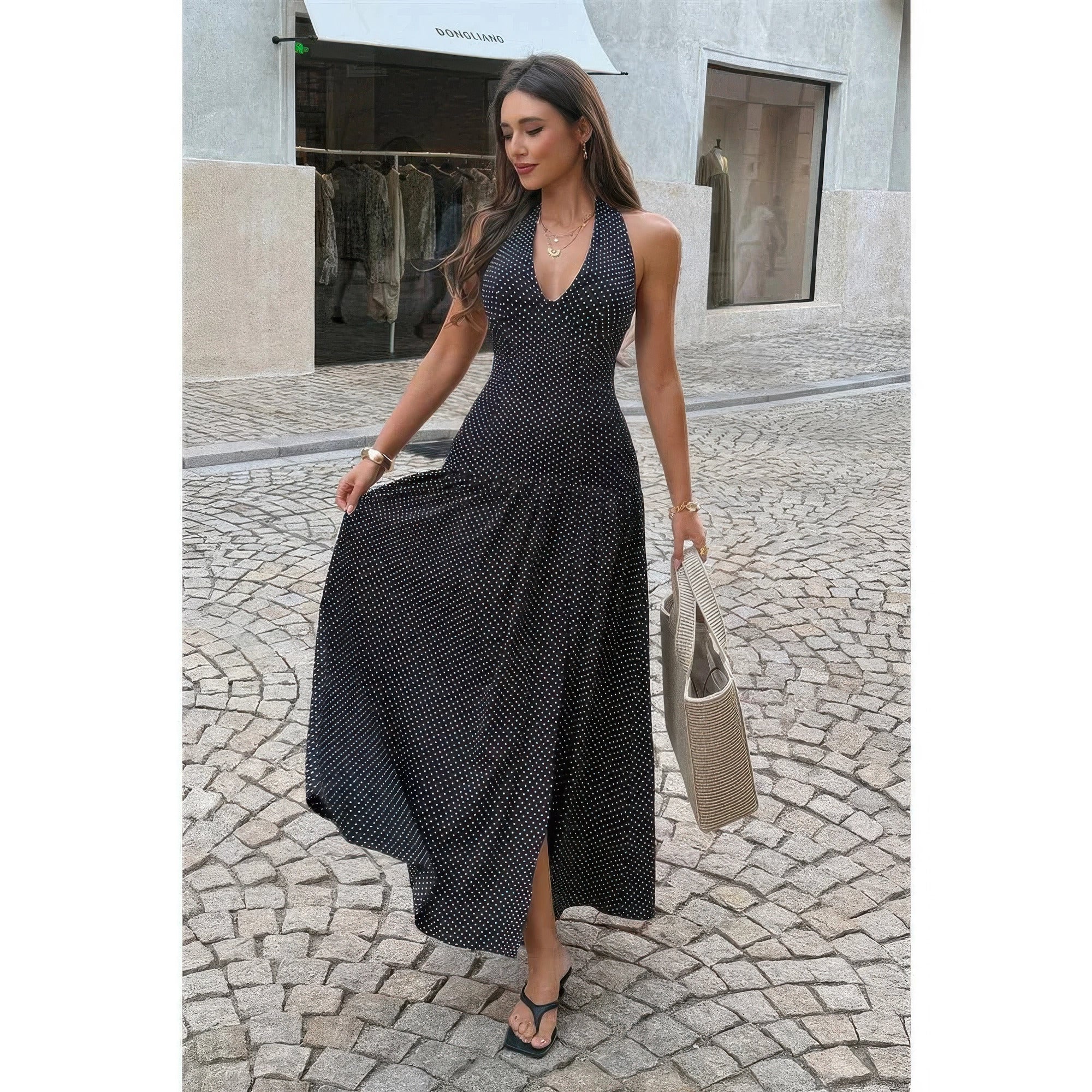Women's black polka dot maxi dress, perfect for summer outings