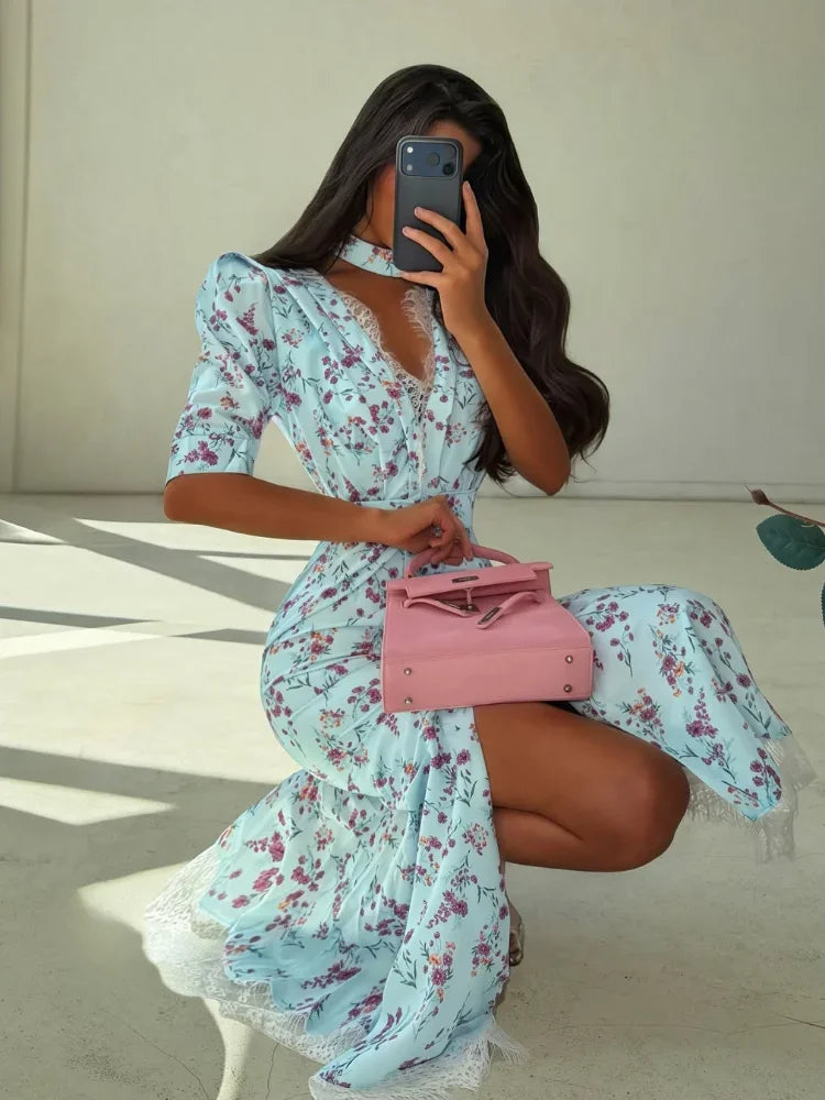 Light blue floral wrap maxi dress for summer outings with stylish handbag