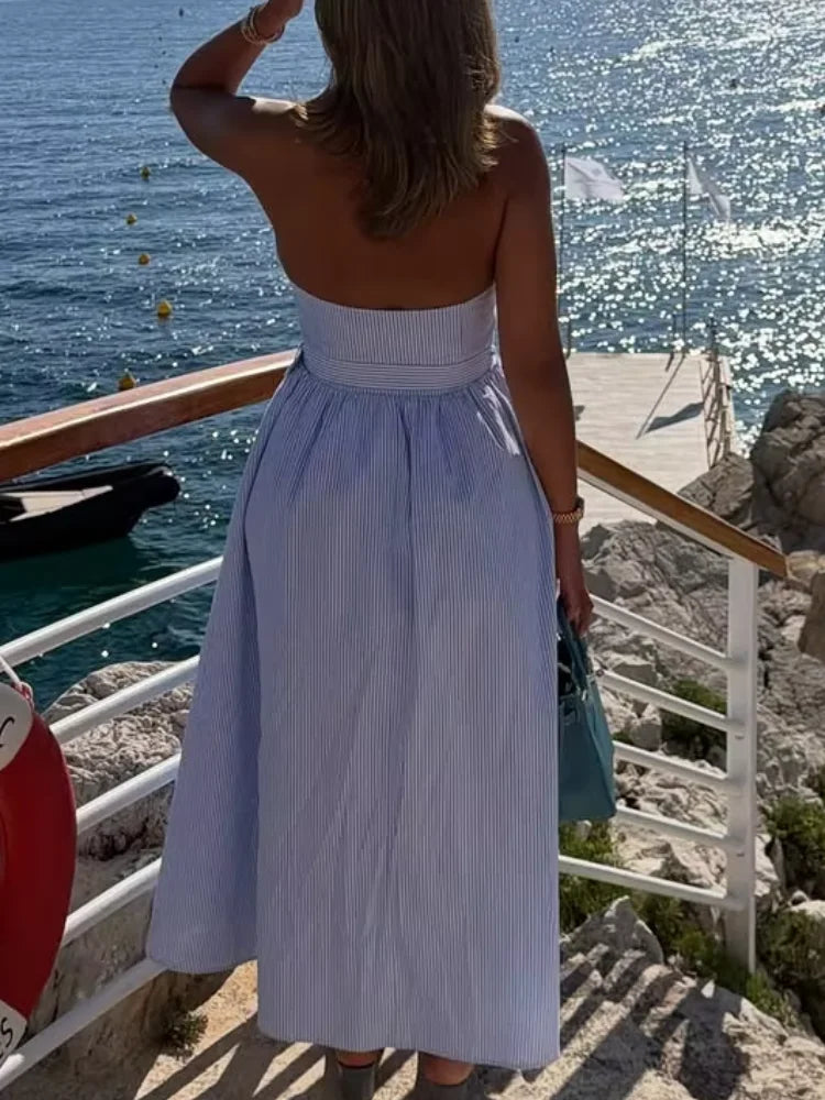 Blue and white striped strapless maxi dress, perfect for beach vacations