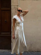 Women's satin midi dress in cream, perfect for summer events
