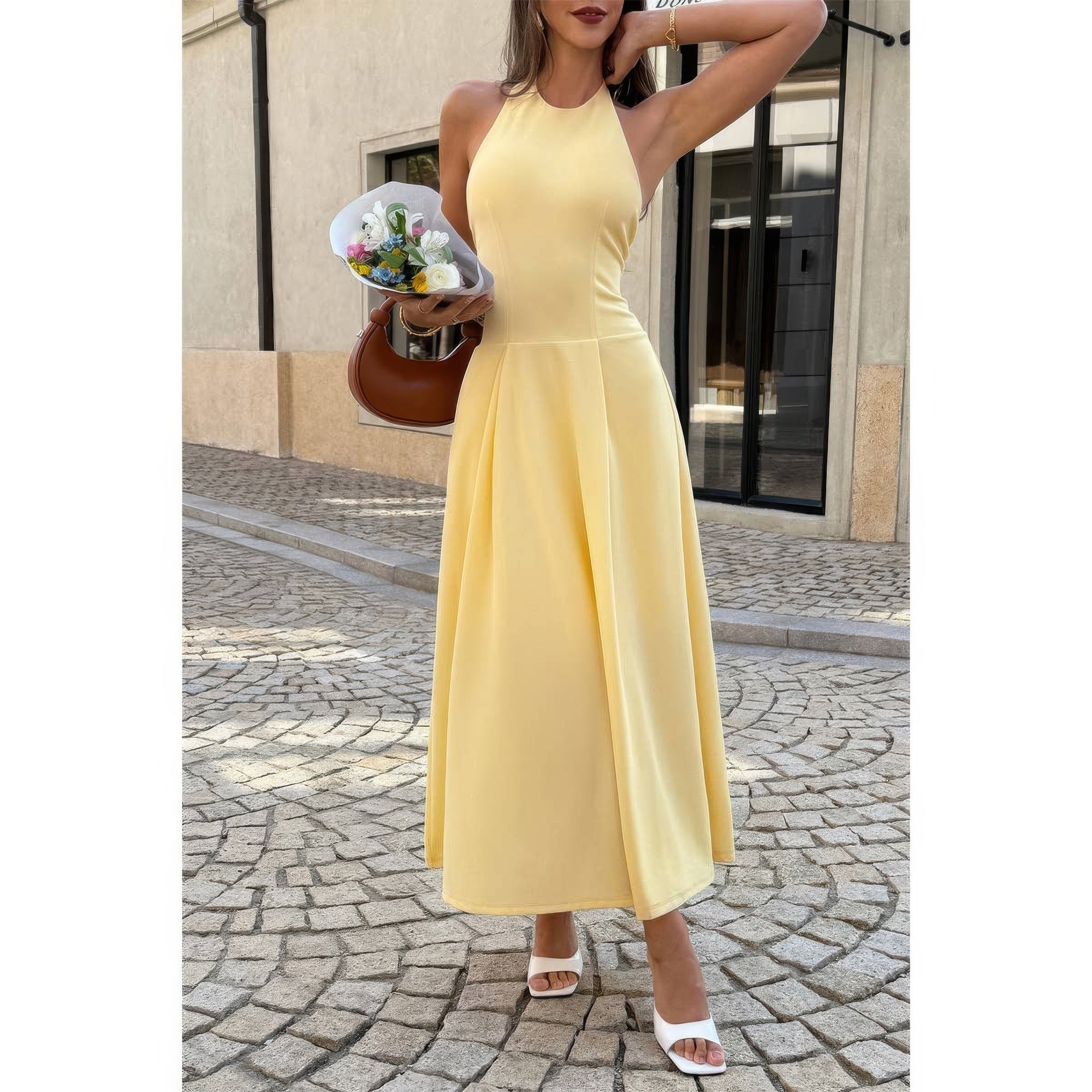 Yellow midi dress made of soft fabric, perfect for summer outings