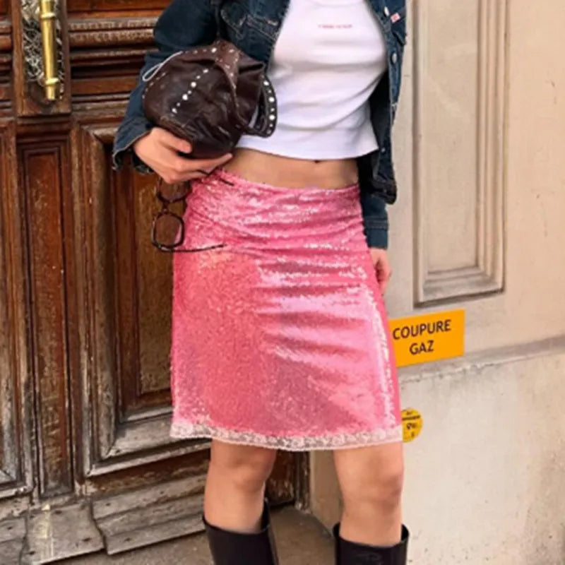 Women's pink midi skirt in soft material, perfect for casual outings