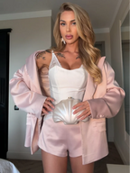 Women's satin mini skirt with a stylish blazer for a chic outfit