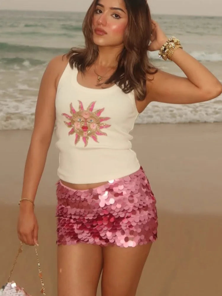 Women's pink sequin mini skirt, perfect for beach outings