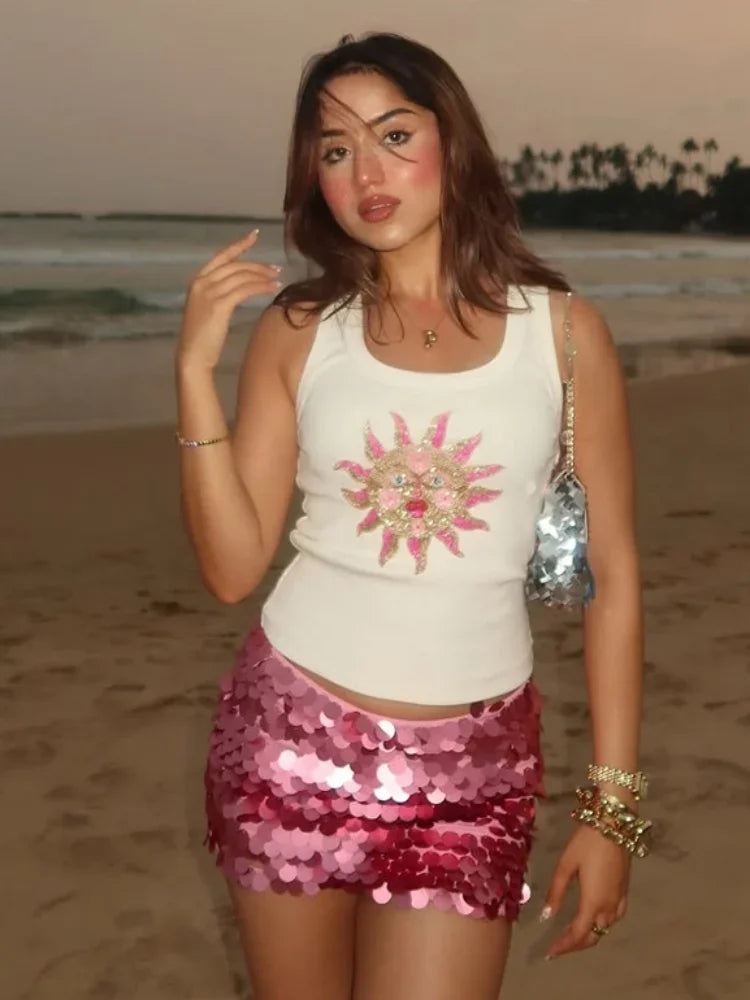 Women's sparkly pink mini skirt, perfect for beach outings