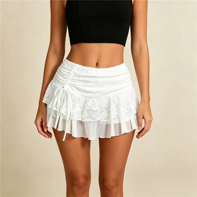 Women's white mini skirt with lace detail, perfect for summer outings