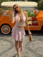 Women's pink mini skirt outfit, lace details, perfect for summer outings
