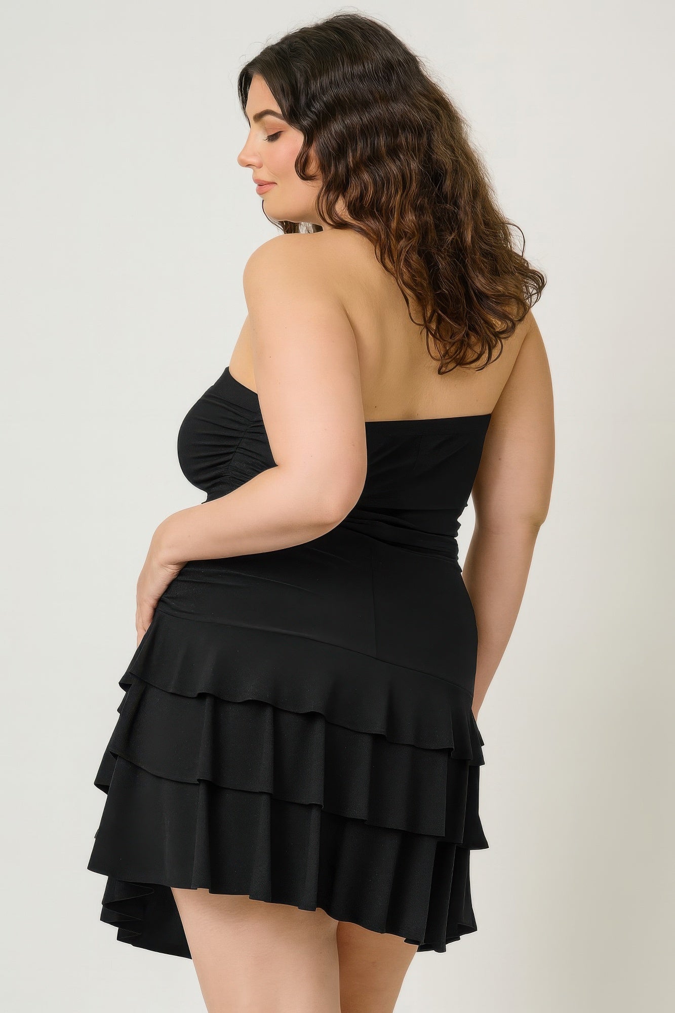 Black plus size dress clothes with layered ruffle design for stylish outings