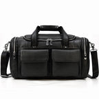 Black leather travel bag with multiple pockets for organization