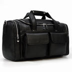 Black leather travel bag with two front pockets for easy organization