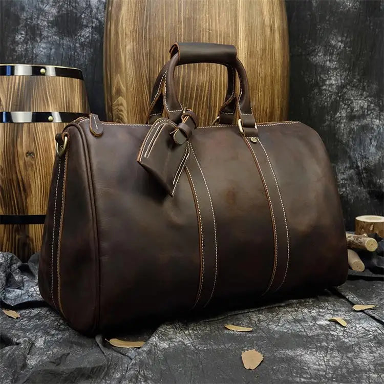 Brown leather travel bag, durable design for weekend getaways