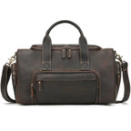 Brown leather travel bag with adjustable shoulder strap for weekend trips