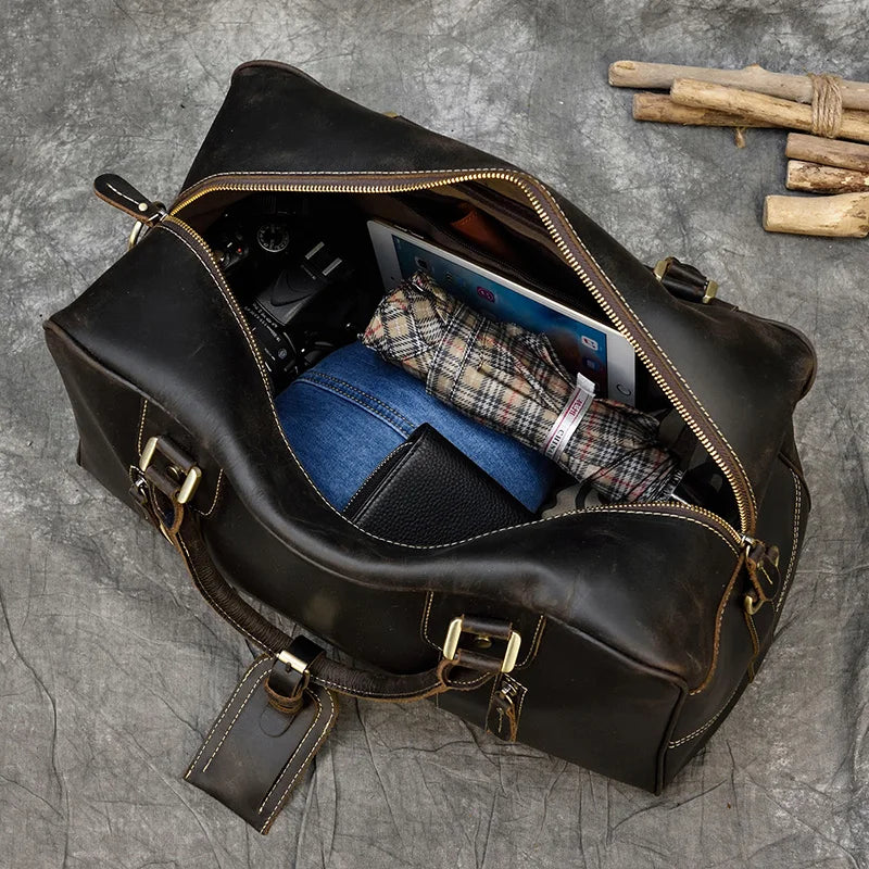 Brown leather travel bag for mens, ideal for weekend getaways