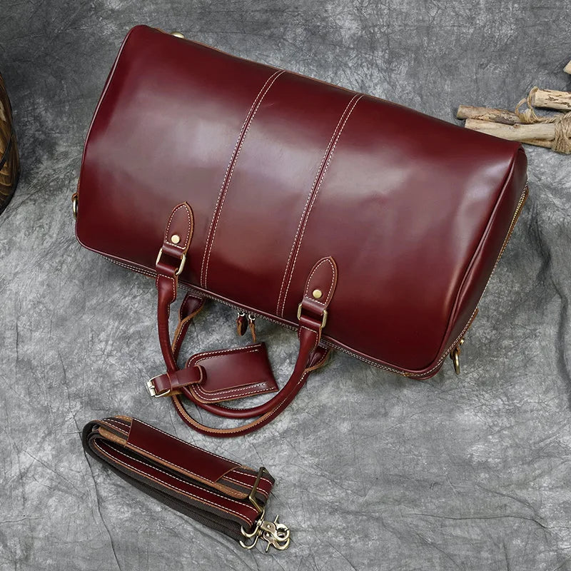 Maroon leather travel bags, perfect for weekend getaways