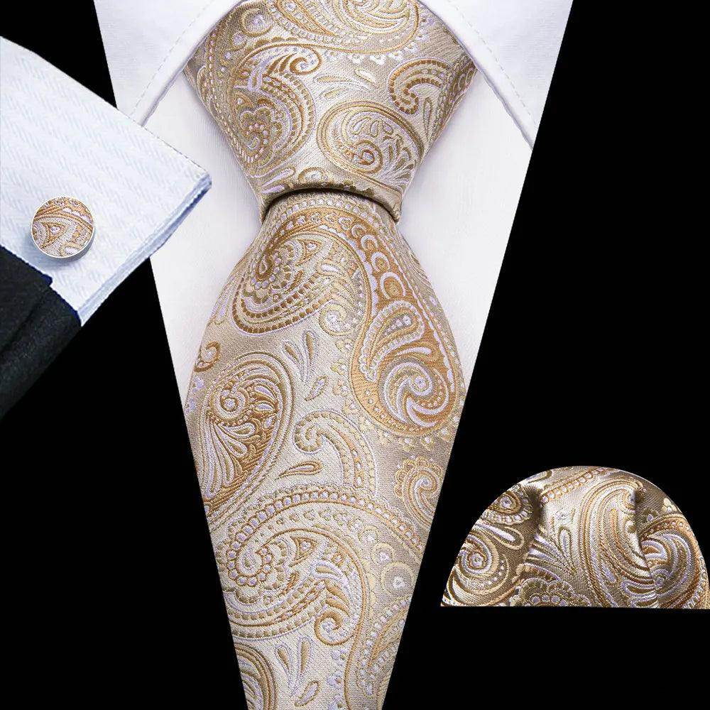 Elegant men's tie and pocket square set with unique necktie designs in gold paisley pattern