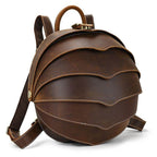 Accordion beetle daypack in brown leather with stylish curved layers and adjustable straps