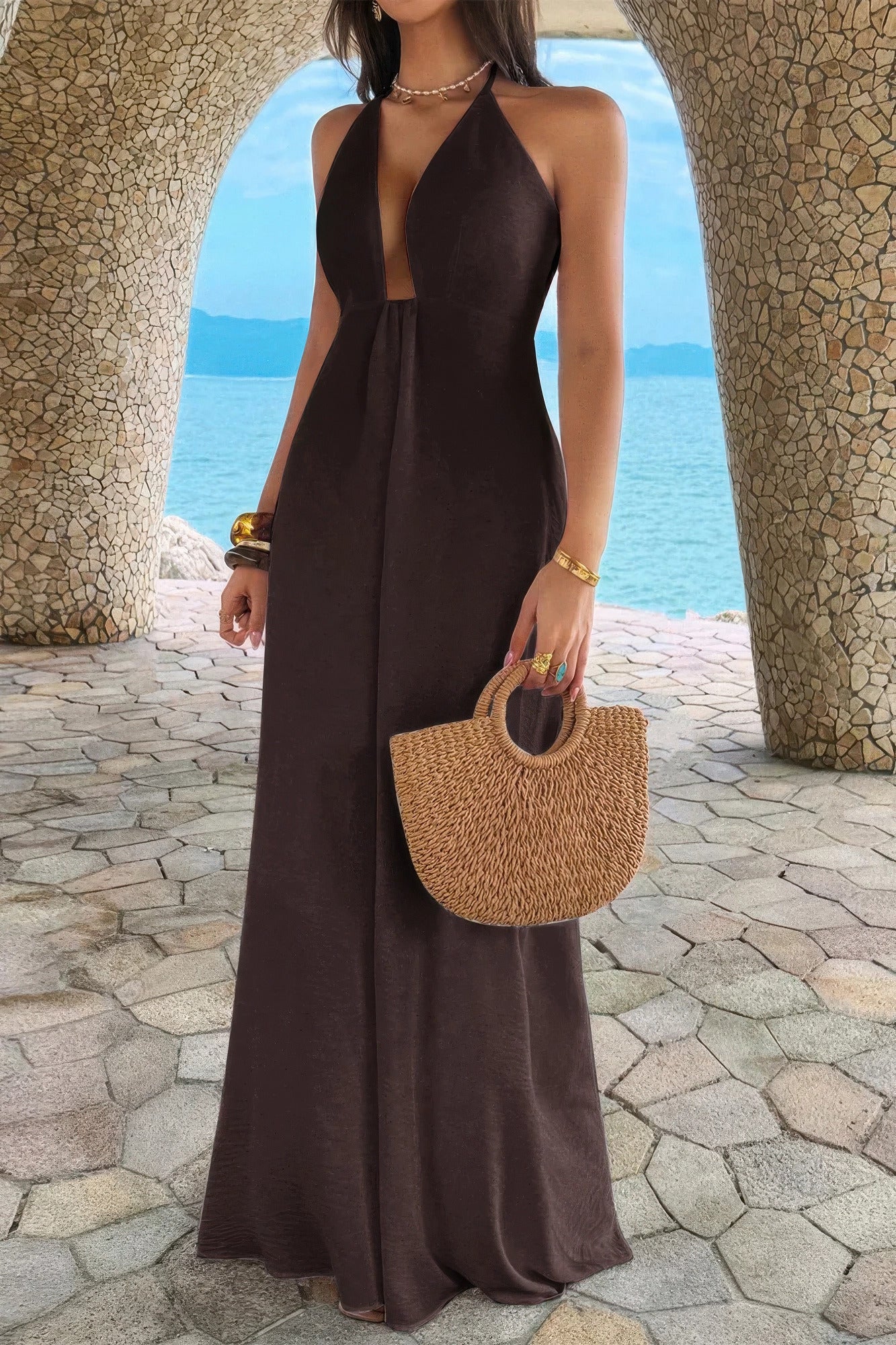 Women's brown halter neck maxi dress, perfect for beach outings.