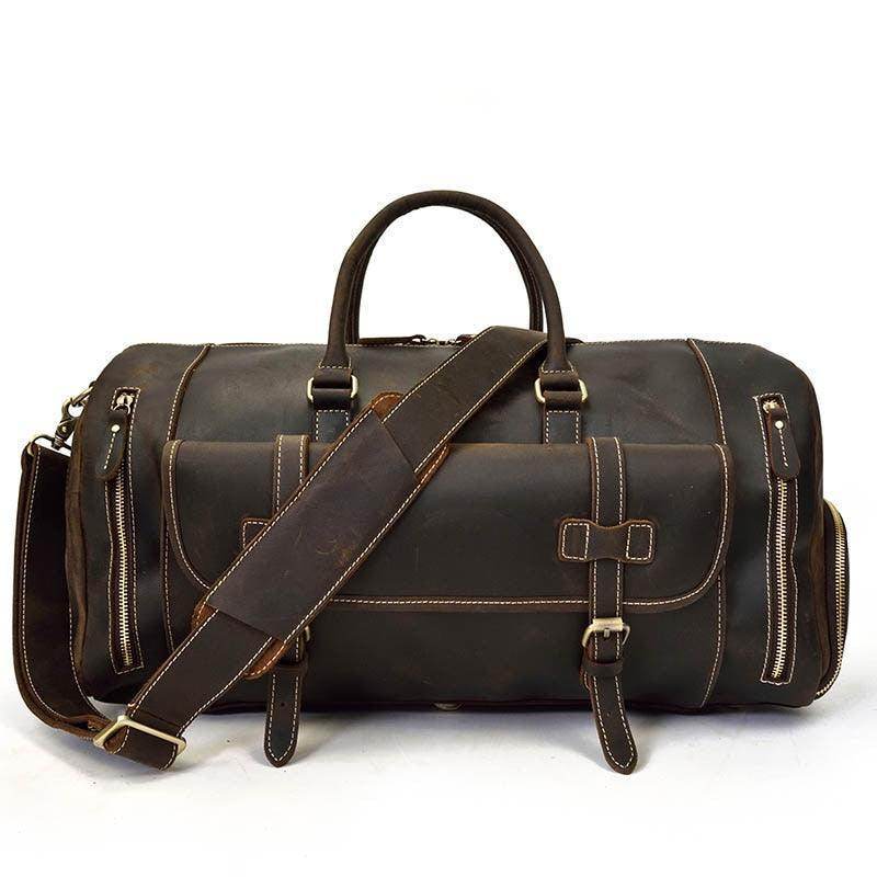 Vintage leather travel duffle bag with multiple pockets and adjustable shoulder strap for stylish travel