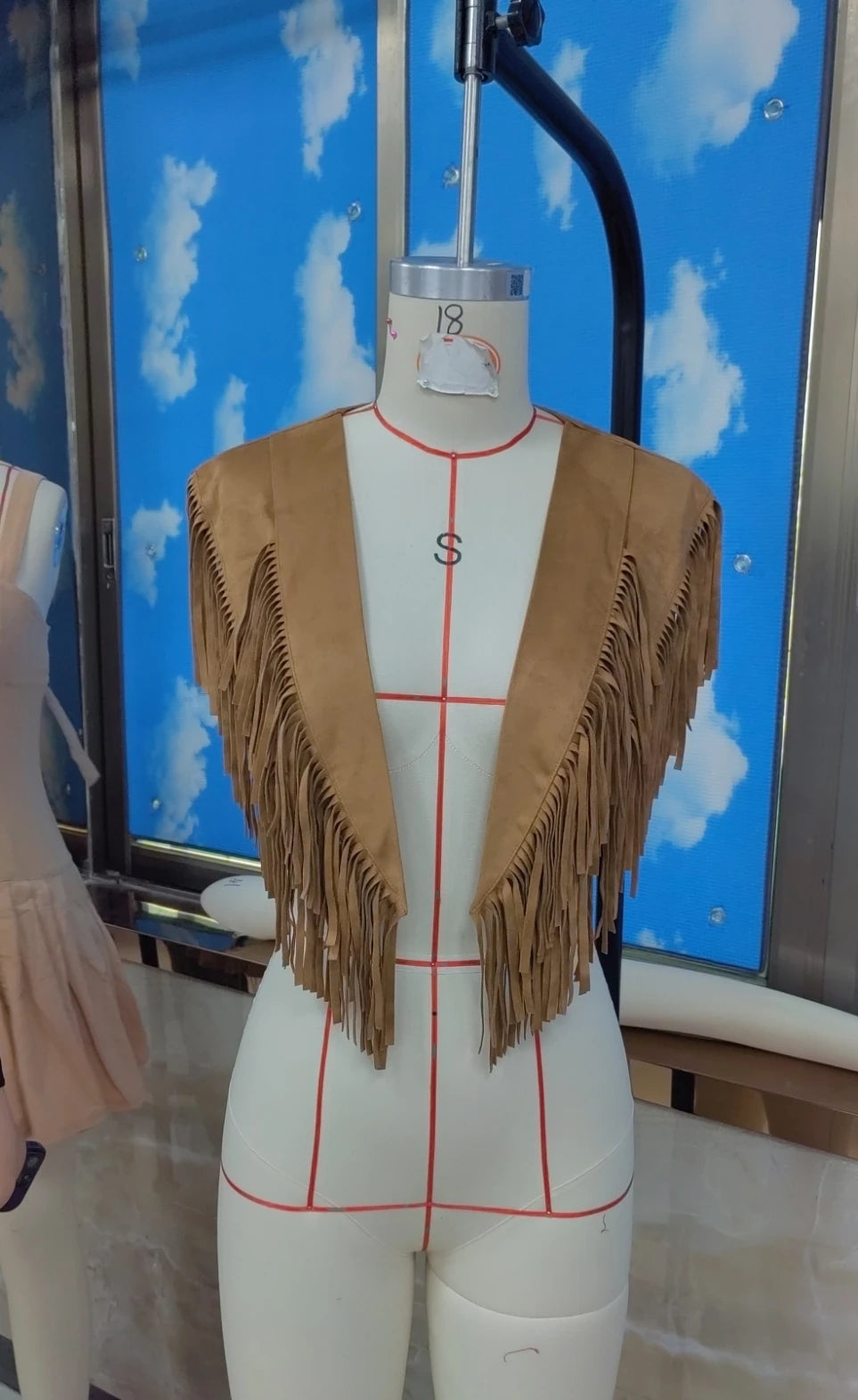 Women's tan suede fringe jacket for stylish layering