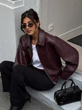 Women's puffer jacket in burgundy puffer, stylish and warm for casual outings