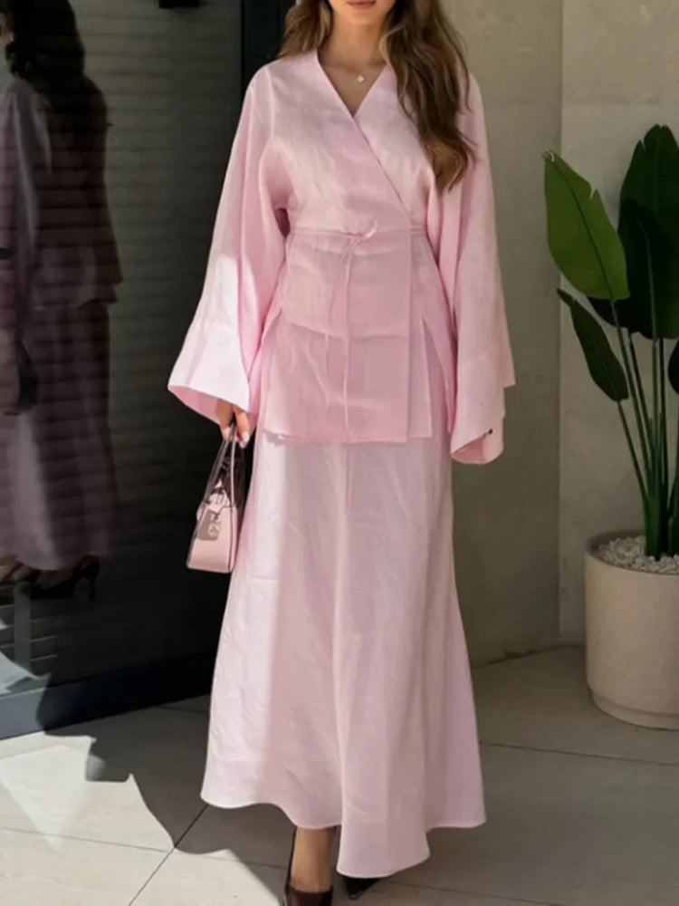 Women's pink wrap skirt in soft fabric for stylish everyday wear