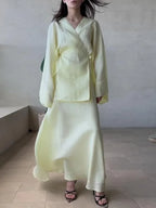 Women's yellow wrap skirt made from lightweight fabric for summer outings